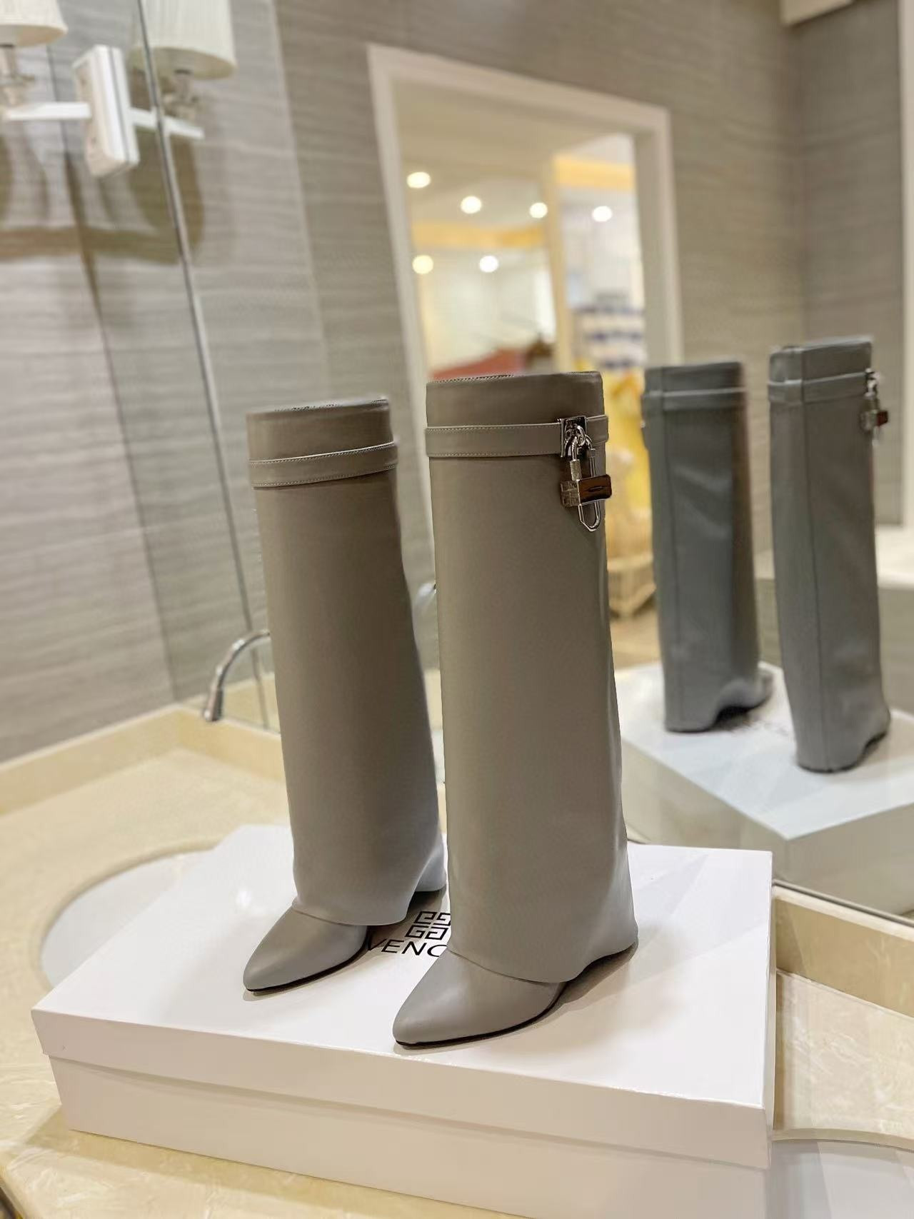 UA Givenchy Shark Lock boots in leather