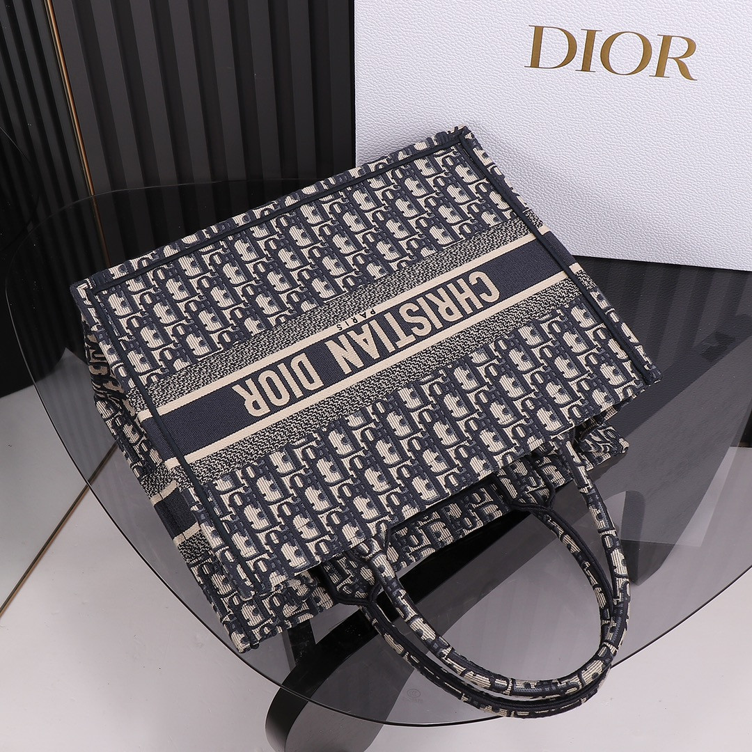 medium D*or book tote  ecru and blue D*or oblique embroidery 14 x 11 x 6.5 inches