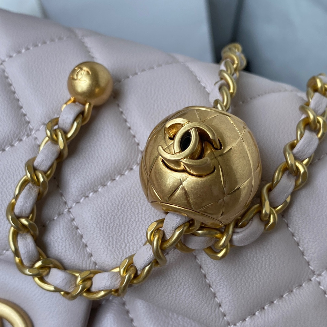 Ch*el mini flap bag shiny calfskin & gold-tone metal light pink 4.7 × 7.8 × 2.3 in