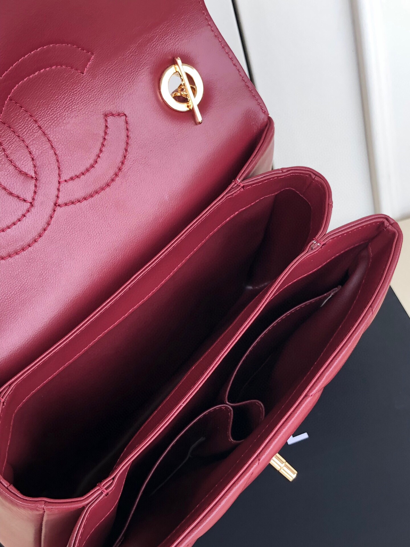 Ch*el flap bag with top handle 6.6 × 9.8 × 4.7 in