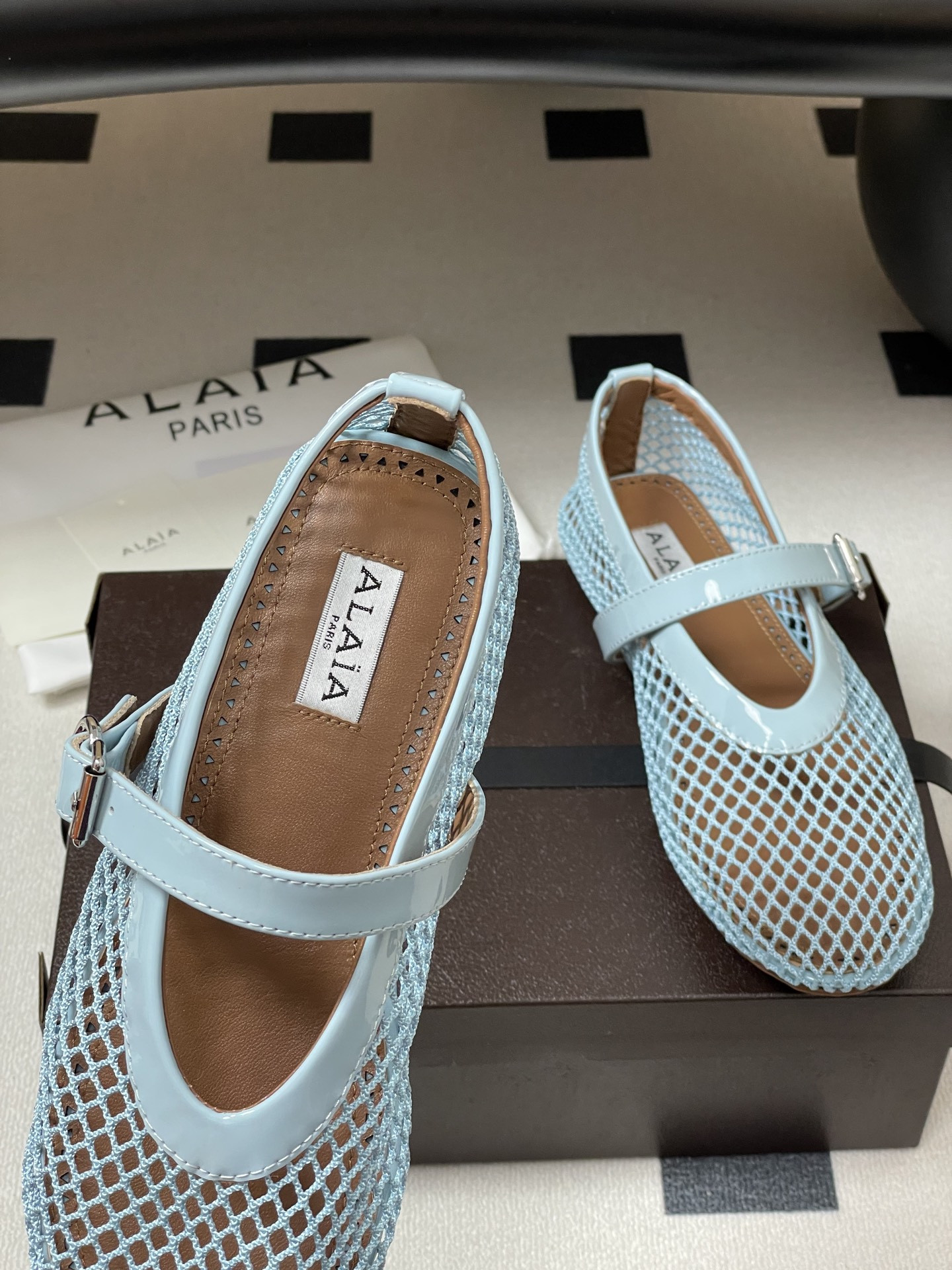 UA ALAÏA BALLET FLATS IN FISHNET