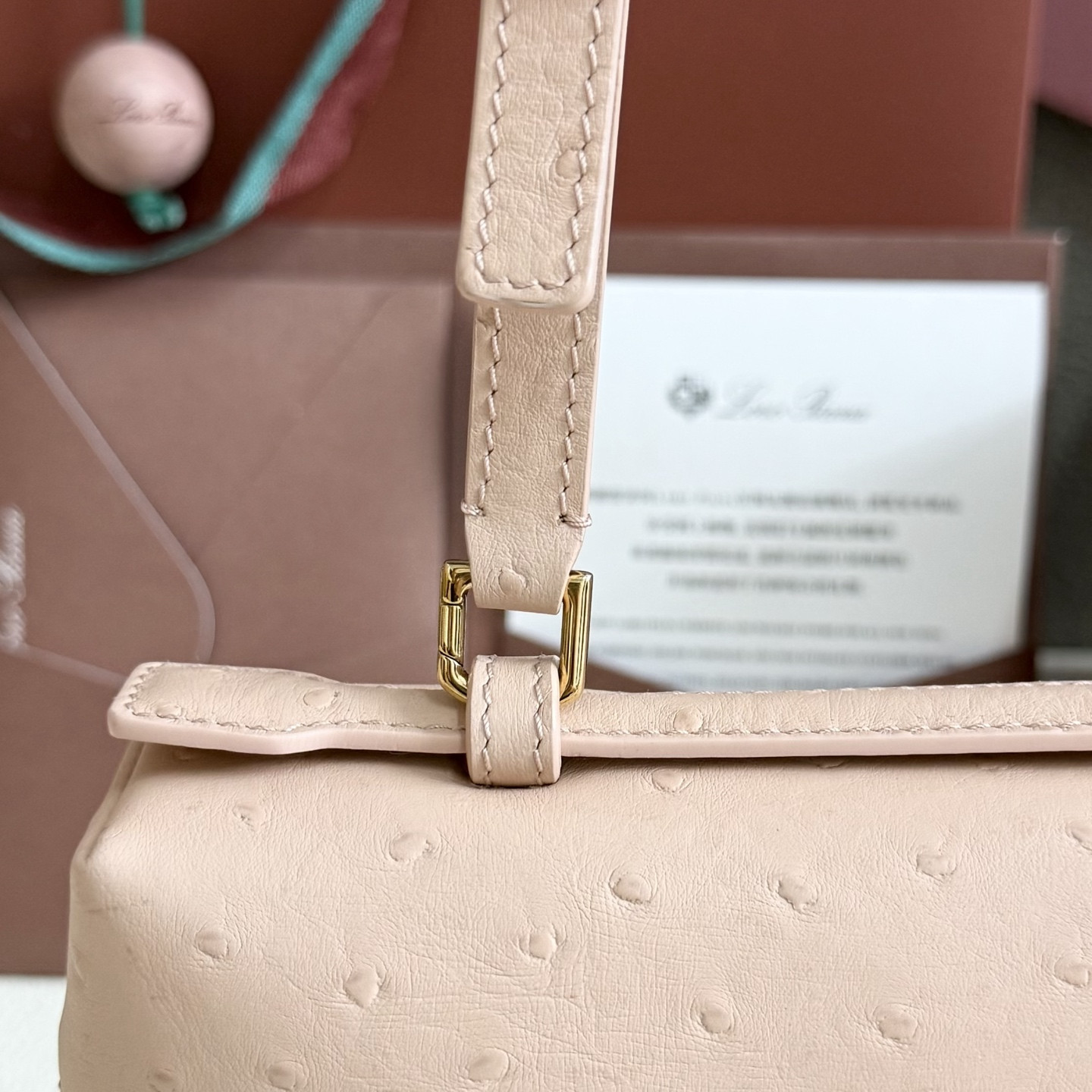 L**o p*ana extra pocket l27 ostrich-grained leather 16x27x10cm